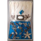 A box of vintage jewellery, silver and white metal, filigree and marcasite.