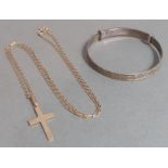 A 9ct gold chain with cross, marked 375, gross wt. 1.75g together with a silver child's bracelet,
