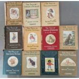 11 Beatrix Potter first edition books.