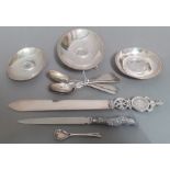A selection of Maltese silver items including three dishes and letter opener together with five