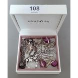 A Pandora silver bracelet and other assorted jewellery.