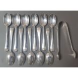 A set of 11 silver teaspoons and sugar tongs, London, Robert Stebbings, 1910, gross wt. 4.9ozt.