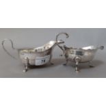 Two silver gravy boats, the smaller gravy boat being marked London, possibly Charles Alchorne, 1760,