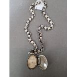 A Victorian white metal mourning locket and chain, length 42cm.