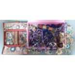 A box of costume jewellery to include vintage and modern, brooches, necklaces, etc together with a