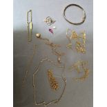 Quantity of yellow metal jewellery to include bangle, chains, pendant, etc. Gross wt. 28g.