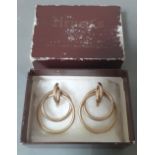 A pair of intertwined hoops 9ct gold earrings, gross wt. 3.9g.