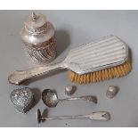 A selection of silver items including a tea caddy, small heart shaped pill box, pusher, two