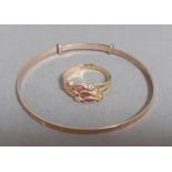 A 9 carat gold bracelet, gross wt. 3.1g. and a 18 carat gold ring with coloured stones, size P/Q,