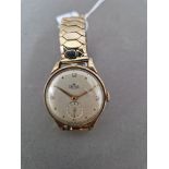 A Smiths Deluxe 9ct gold wristwatch, circa 1950s, case diam. 35mm....