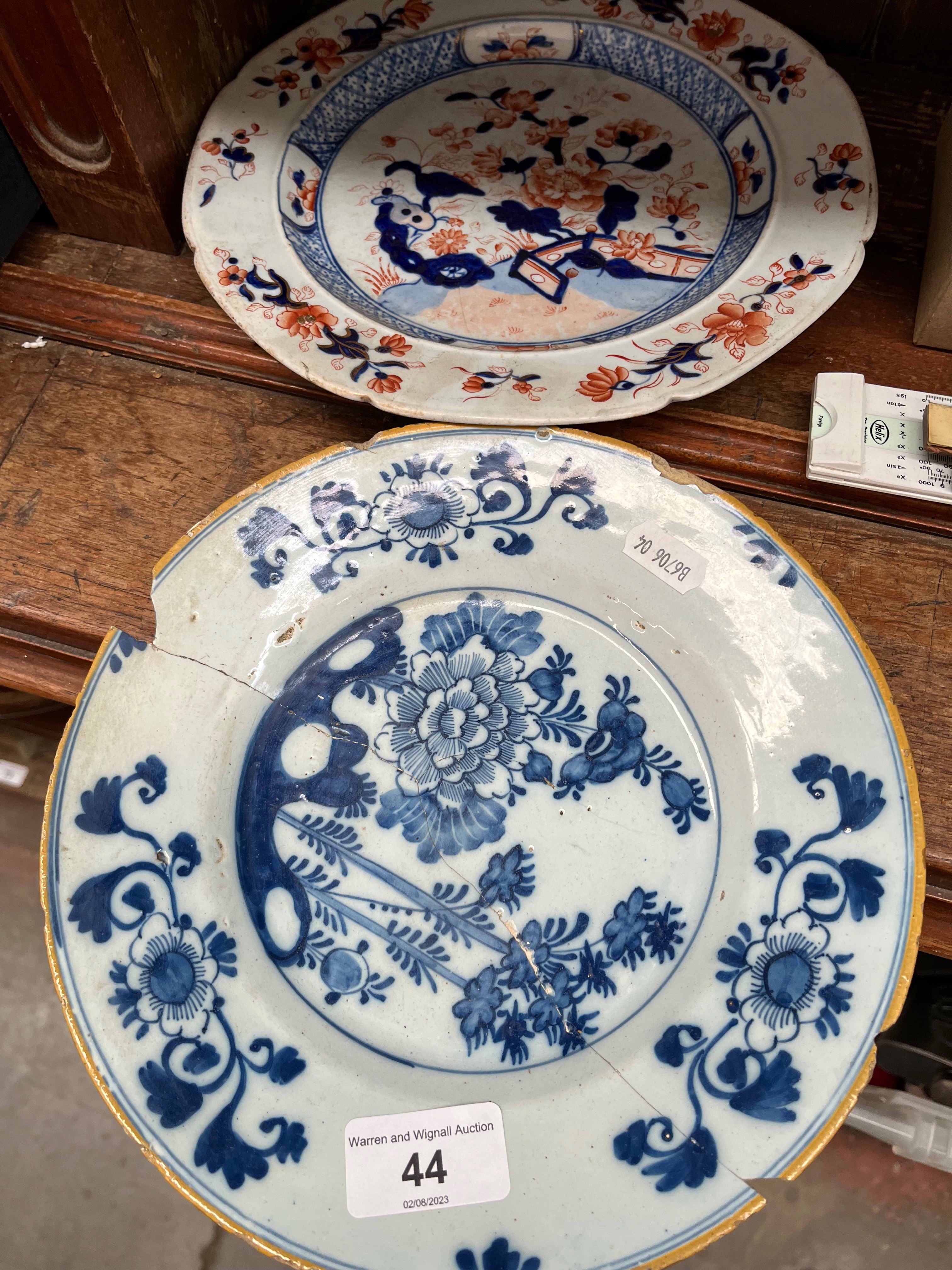 Two 18th century Dutch delft plates.