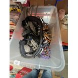 A box of mountaneering items, harness, quickdraws, rope, nuts, etc