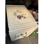 A cream painted storage box.