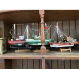 Three model boats