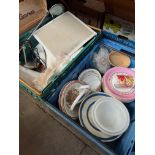 A crate of mixed ceramics and a crate including linen, treen, reading light, vintage tins etc