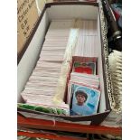A shoe box containing several hundred Match Attax trading cards