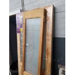 A part glazed internal bi-folding door together with 2 glazed knotty pine interior doors.