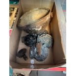 A box containing vintage car horns and helmet.