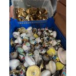 A quantity of hardware ( knobs & handles ), decorative, brass and pottery.