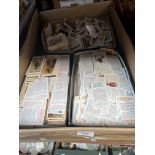 A box containing 3 small shoe boxes of cigarette cards, mainly mammals.
