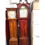 A 19th century mahogany eight day long case clock, 13 1/2" arched dial indistinctly signed '...