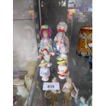 Eight porcelain pin cushion dolls - various sizes