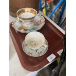 A tray of assorted European porcelain including a Meissen cup and saucer.