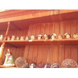 12 Royal Doulton miniature character jugs including Cardinal, Aramis etc.