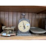 A vintage Hughes family scale with tray, by Salter and a small set of postal scales with weights.