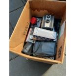 A box of radios and cameras, etc.