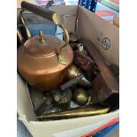 A box of metalware to include brass, copper, trivets, copper kettle, a plane, etc.