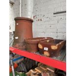 A terracotta chimney pot and two salt glazed troughs/planters.