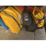 A collection of rope access/rescue equipment including stretcher, three rope access type