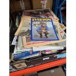 A box of Football ephemera including programmes and other memorabilia.