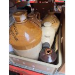 A box of stoneware to include jars, bed warmer, ink bottle, tiles.