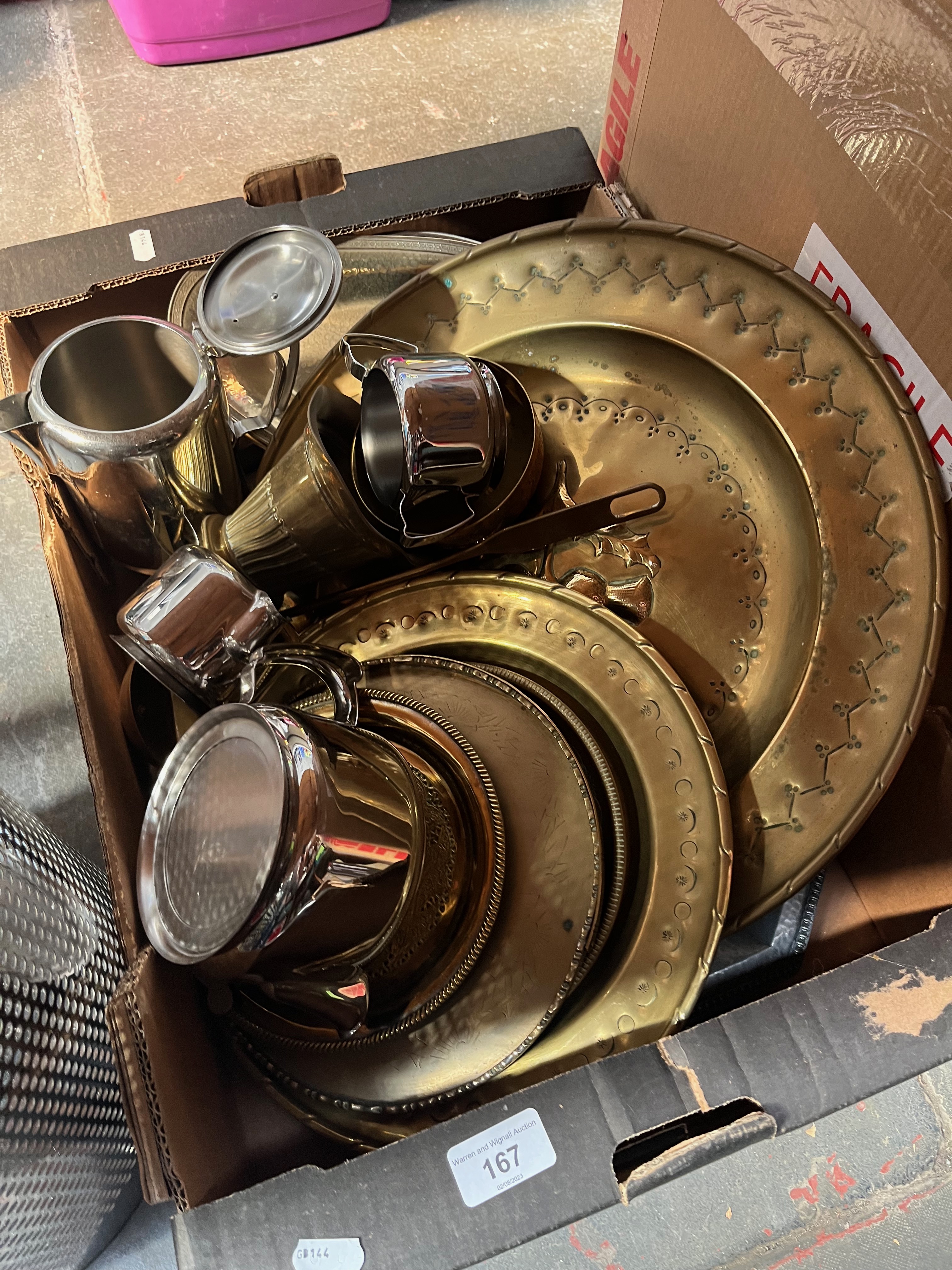 A box of stainless steel-wear and brass-ware together with a stainless steel waste bin.