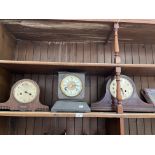 3 mantel clocks.