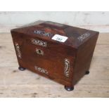 A 19th century rosewood tea caddy with mother of pearl inlay, length 22.5cm.