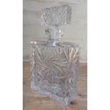 A cut glass decanter of square form, height 25.5cm.