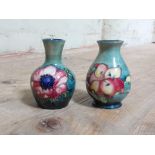 A matched pair of Moorcroft pottery vases, height 9.5cm.