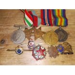 A mixed lot of medals and badges including a British War medal 323970 SPR J T COURT RE, a Victory