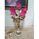 A late 19th century gilt bronze and marble four branch candelabra converted to electric, height