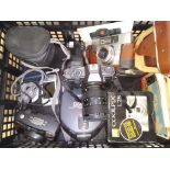 A box of cameras including a Pentax P30 and a bundle of vintage postcards etc.