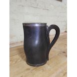 A hallmarked silver mounted leather jug height 24.5cm.