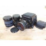 A Mamiya RB67 Profesional S medium format SLR camera, serial no. C553906, with two Mamiya-Sekor C