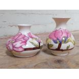 Two Moorcroft pottery vases, heights 10cm & 13cm.