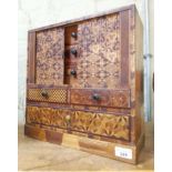 A Japanese parquetry inlaid cabinet, height 36cm.