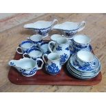 A tray of assorted 18th century blue and white porcelain, the majority crescent marked Worcester and