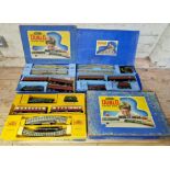 Three Hornby Dublo 3-rail boxed train sets to include EDP2, EDP12 & one other.