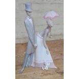 A large Lladro figure group 'Couple with Parasol', number 4563, height 50.5cm.